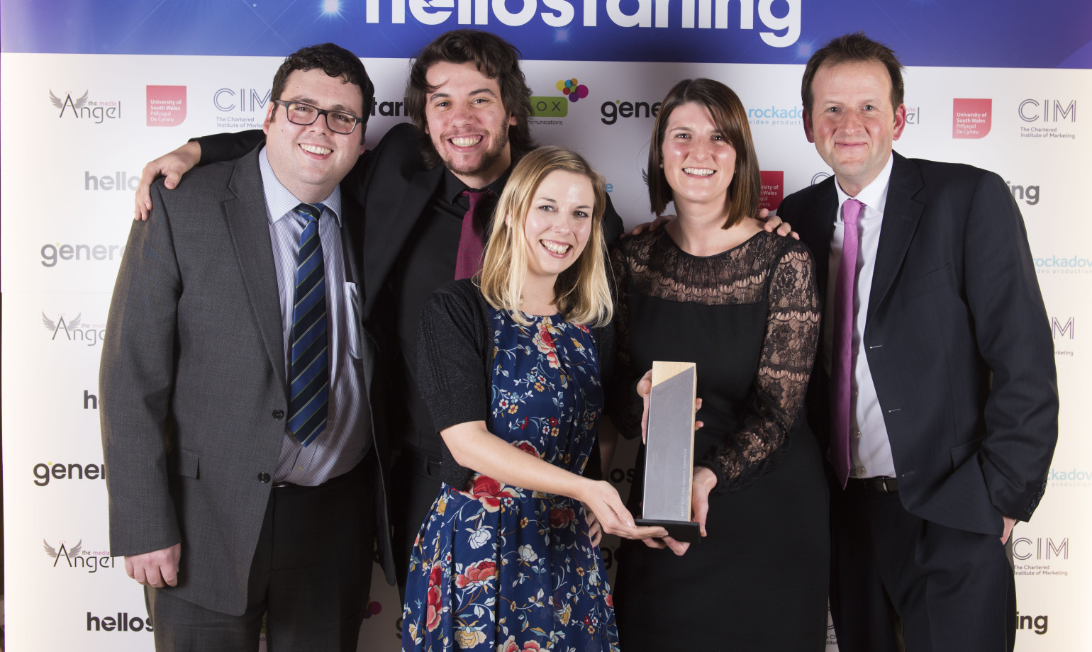 A photo of Richard Millar, Managing Director, with members of the team from Tenovus Cancer Care receiving an award for the Tenovus Solo Campaign in 2016